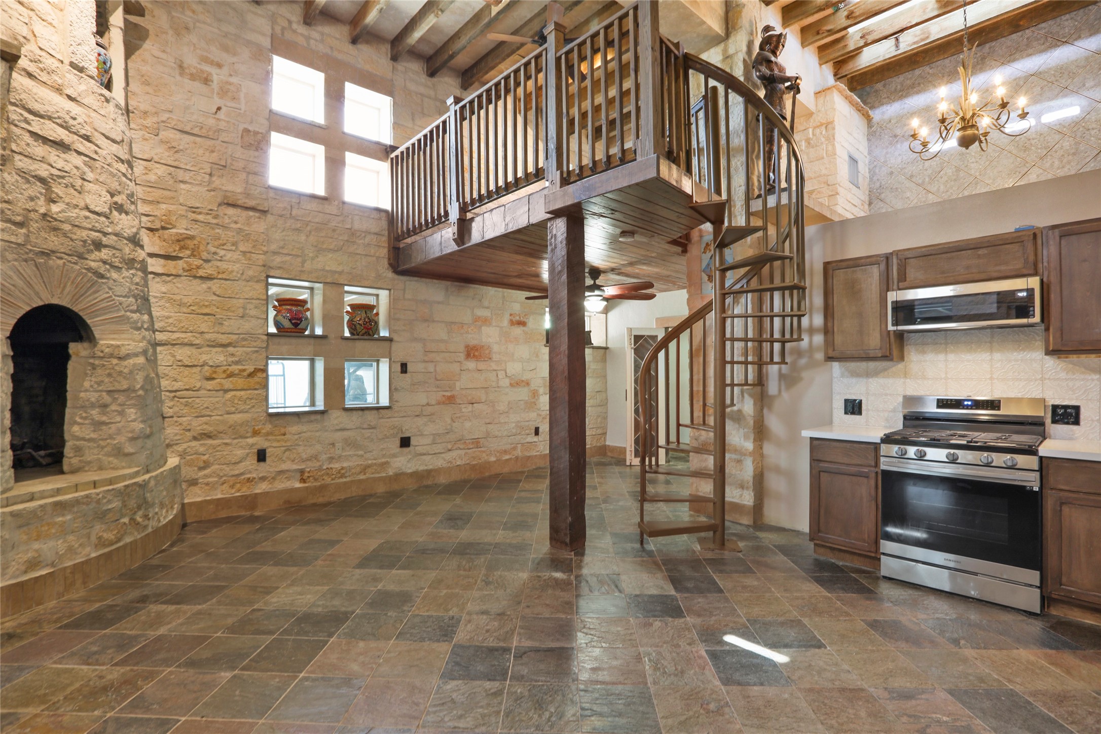 614 Pine Gully Road, Unit LOFT Seabrook, TX 77586 - Photo 3 of 29 a view of a street with brick walls