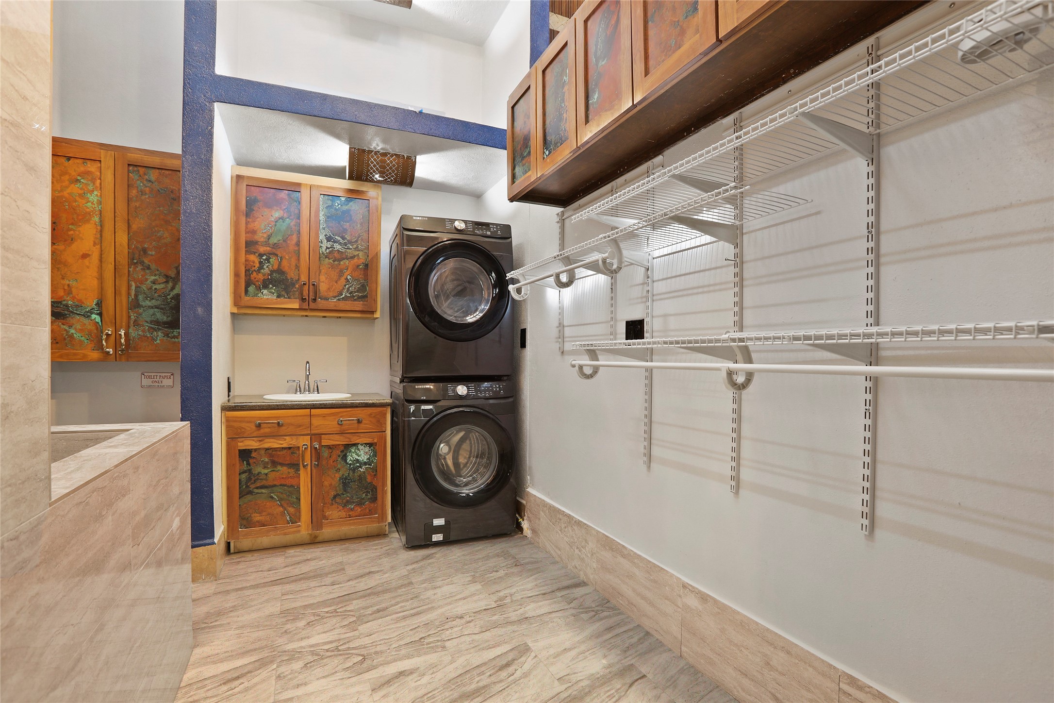 614 Pine Gully Road, Unit LOFT Seabrook, TX 77586 - Photo 9 of 29 a view of a storage & utility room with washer and dryer