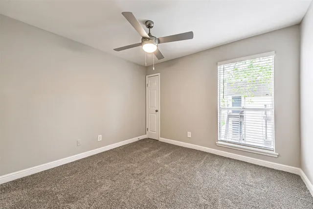 a kitchen with stainless steel appliances a refrigerator stove and microwave