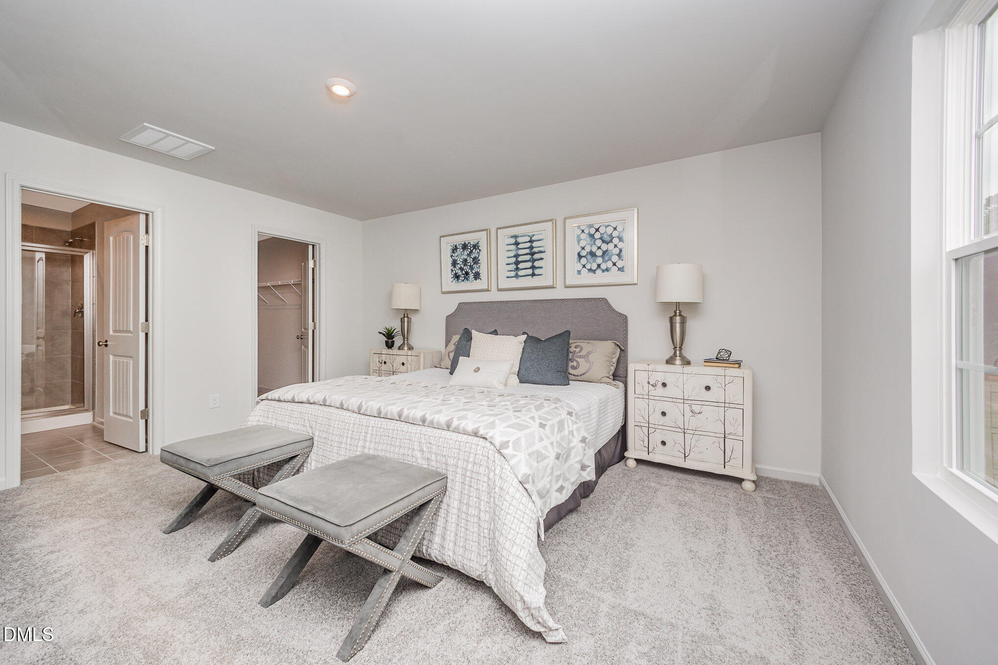 272 Johnson Rdg Way, Unit 1 Four Oaks, NC 27524 - Photo 18 of 27 a bedroom with a bed and a window