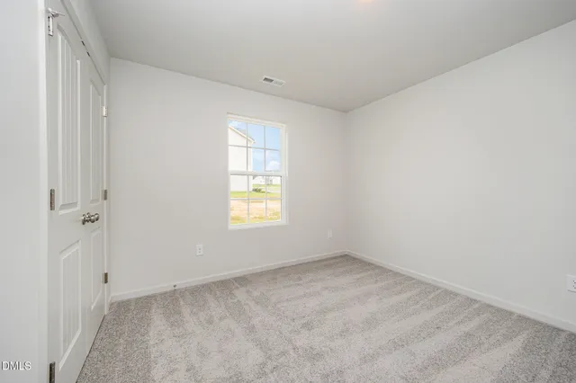 a view of a workspace with furniture