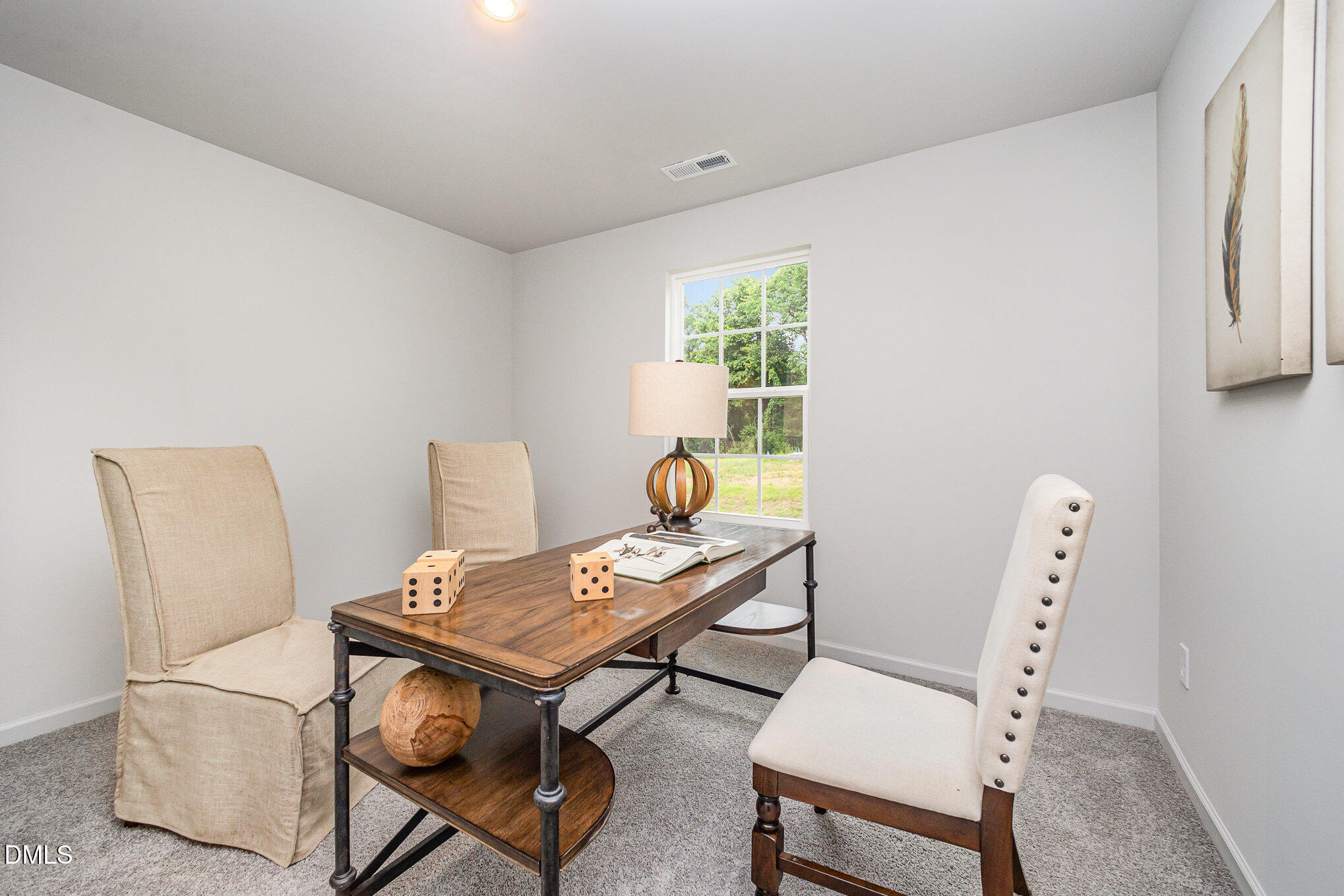 272 Johnson Rdg Way, Unit 1 Four Oaks, NC 27524 - Photo 23 of 27 a view of a workspace with furniture