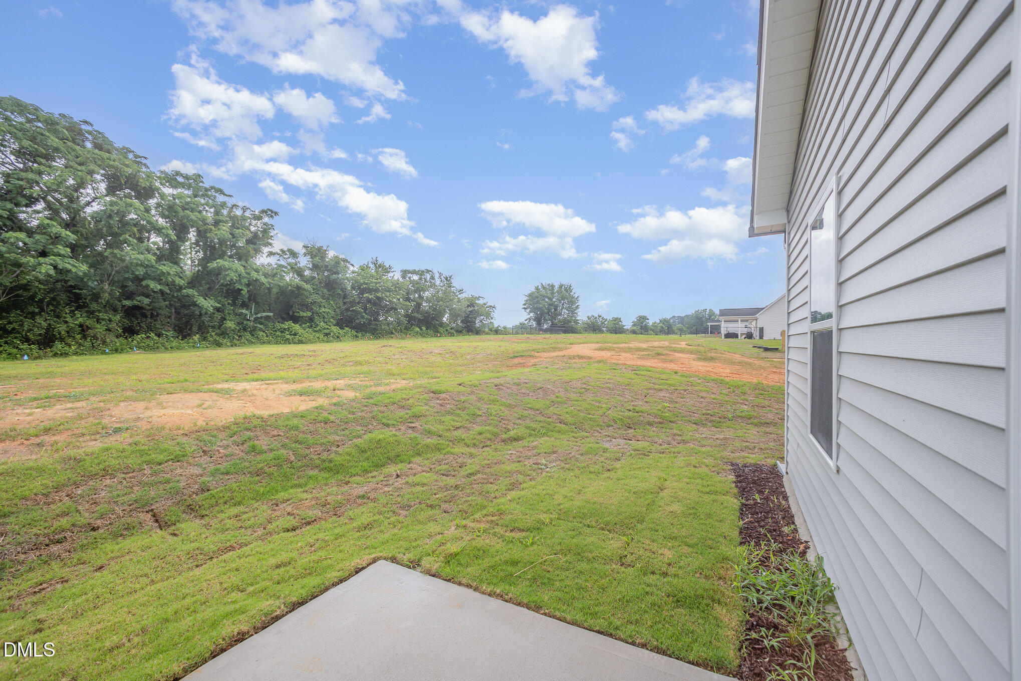 272 Johnson Rdg Way, Unit 1 Four Oaks, NC 27524 - Photo 8 of 27 a view of an ocean from a balcony