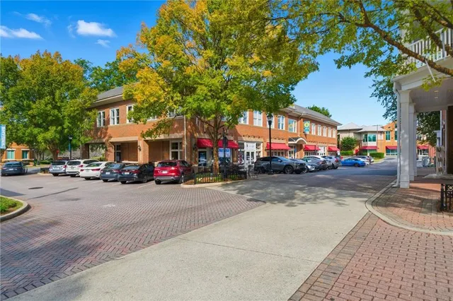 a view of street with parked cars