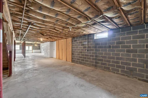 a view of an empty room with a sink
