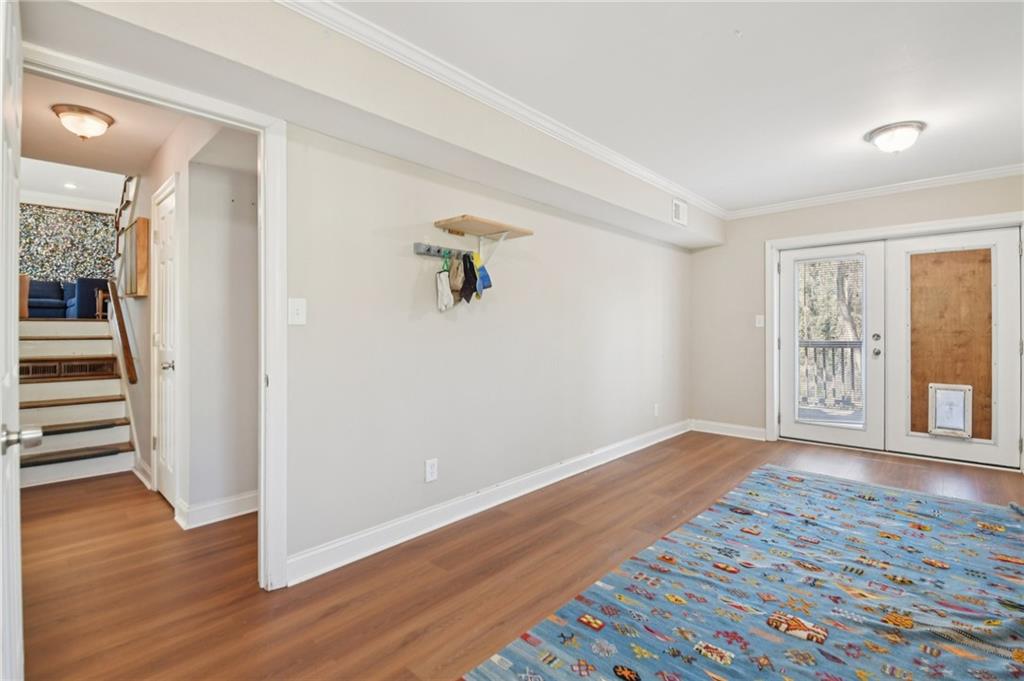 3459 Tulip Drive Decatur, GA 30032 - Photo 12 of 17 wooden floor in an empty room with a window