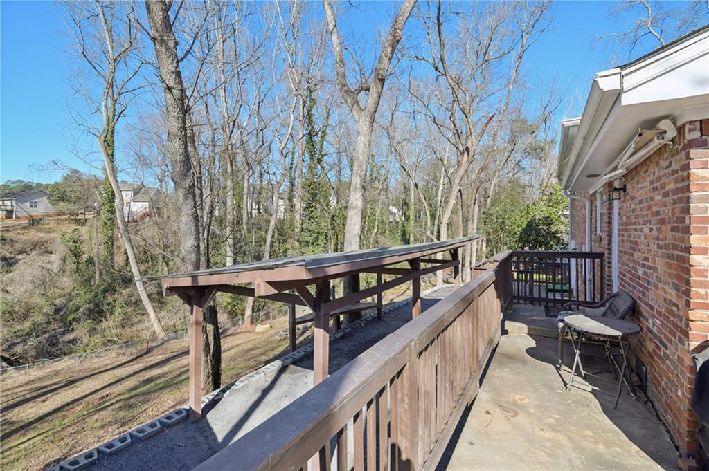3459 Tulip Drive Decatur, GA 30032 - Photo 15 of 17 a view of balcony with wooden floor and fence