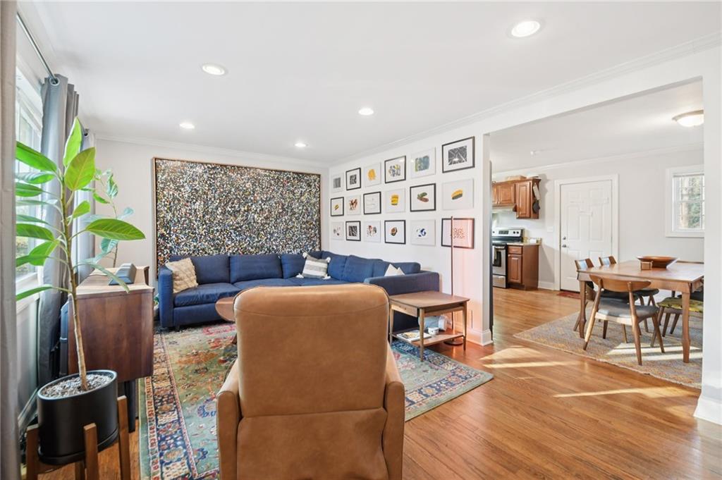 3459 Tulip Drive Decatur, GA 30032 - Photo 2 of 17 a living room with furniture a dining table and a potted plant