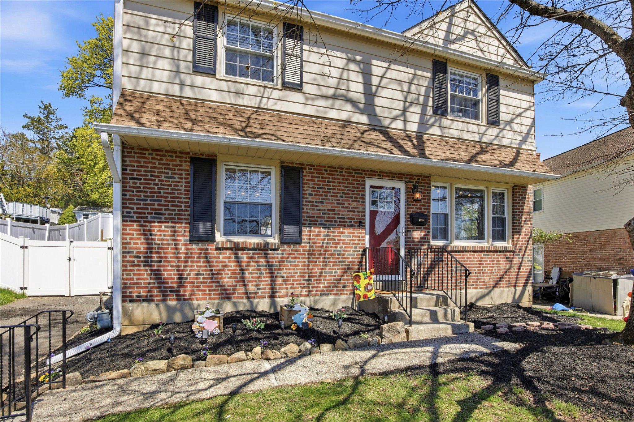 2907 Kanes Road Willow Grove, PA 19090 - Photo 3 of 28 fFront Elevation with vibrant flower beds