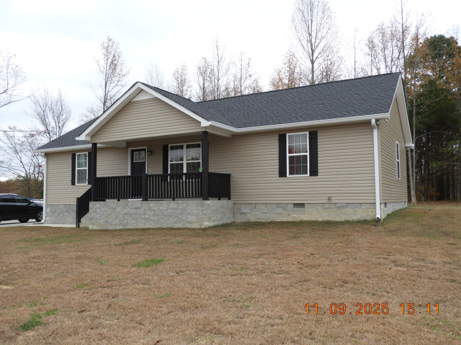 3135 Oak Grove Road Goodspring, TN 38460 - Photo 2 of 62 a front view of a house with a yard