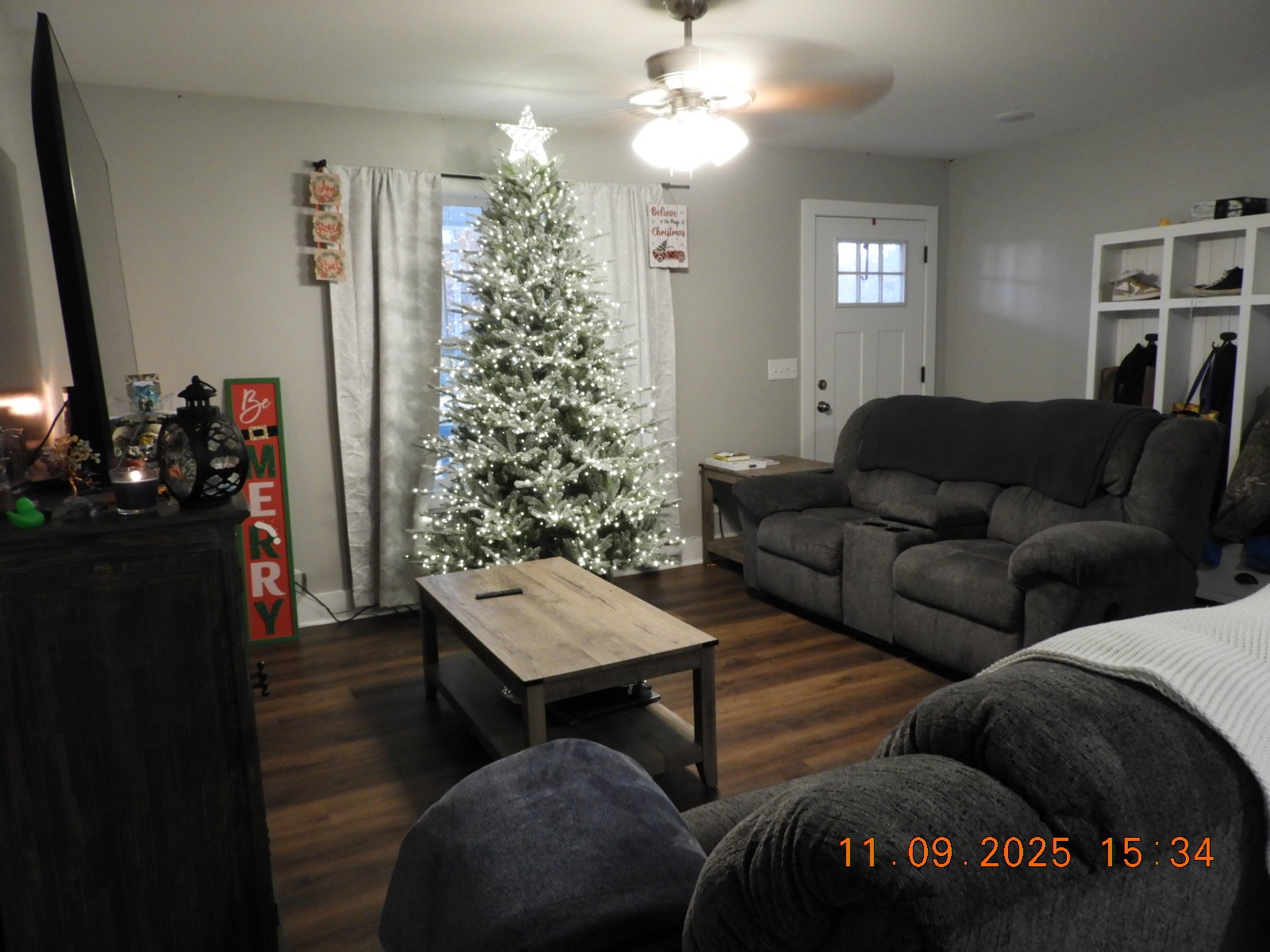 3135 Oak Grove Road Goodspring, TN 38460 - Photo 29 of 62 a living room with furniture and a chandelier