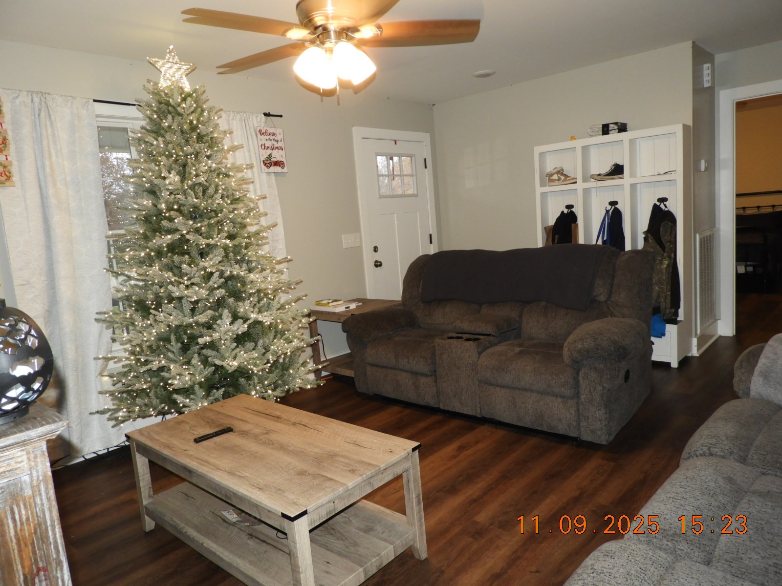 3135 Oak Grove Road Goodspring, TN 38460 - Photo 33 of 62 a living room with furniture and a chandelier