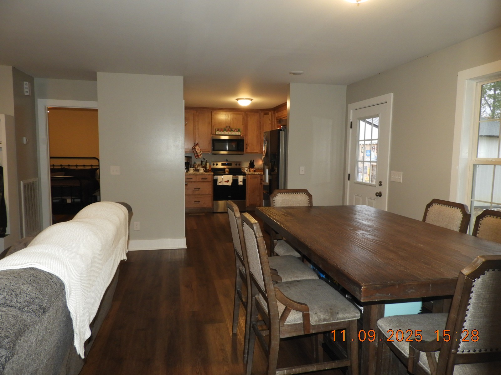 3135 Oak Grove Road Goodspring, TN 38460 - Photo 40 of 62 a living room with furniture a table and wooden floor