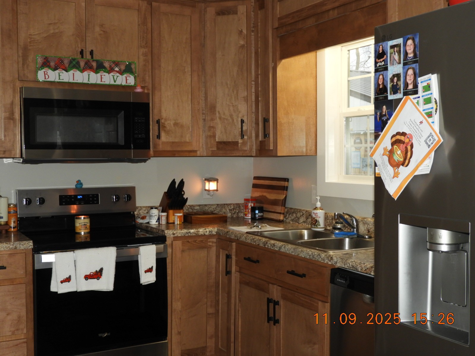 3135 Oak Grove Road Goodspring, TN 38460 - Photo 48 of 62 a kitchen with stainless steel appliances granite countertop a stove a sink and a microwave