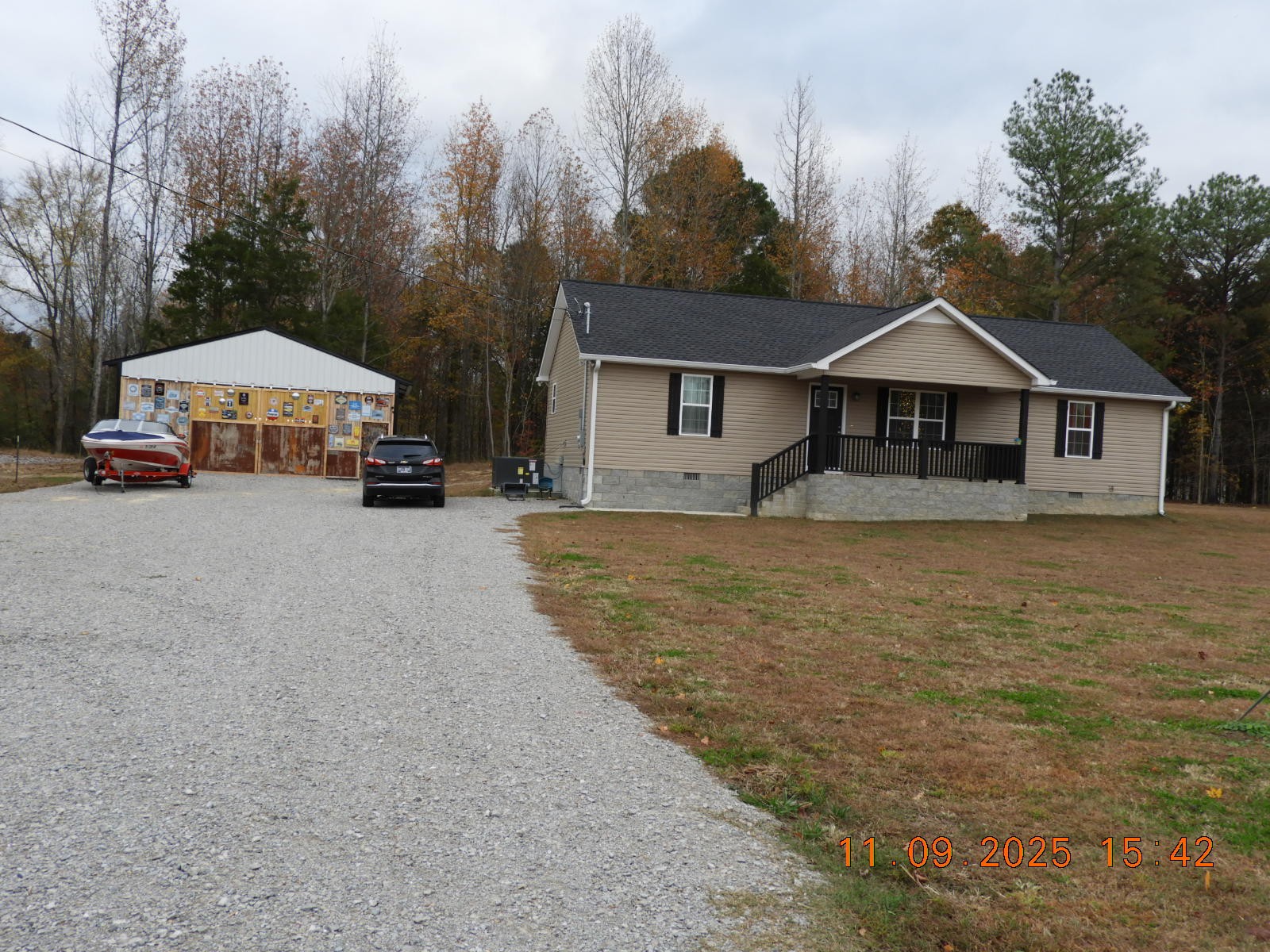 3135 Oak Grove Road Goodspring, TN 38460 - Photo 9 of 62 a house with trees in front of it