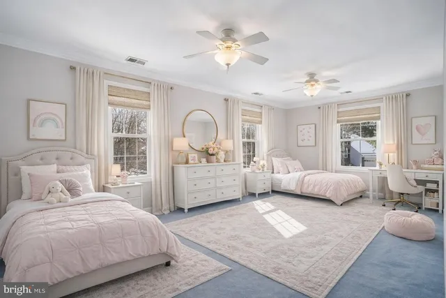 a bedroom with a large bed and a couch