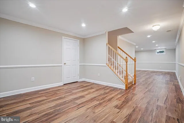 a bathroom with a sink a toilet and shower curtain