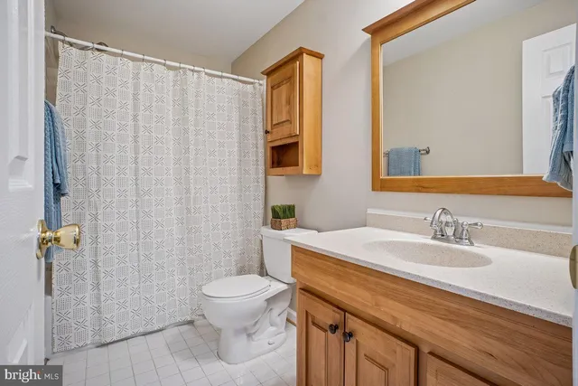 a view of an empty room with storage