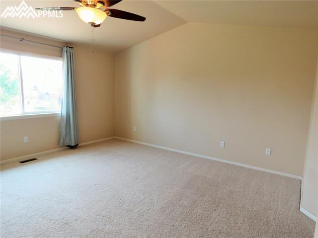 12249 Rio Secco Road Peyton, CO 80831 - Photo 13 of 28 Master Bedroom