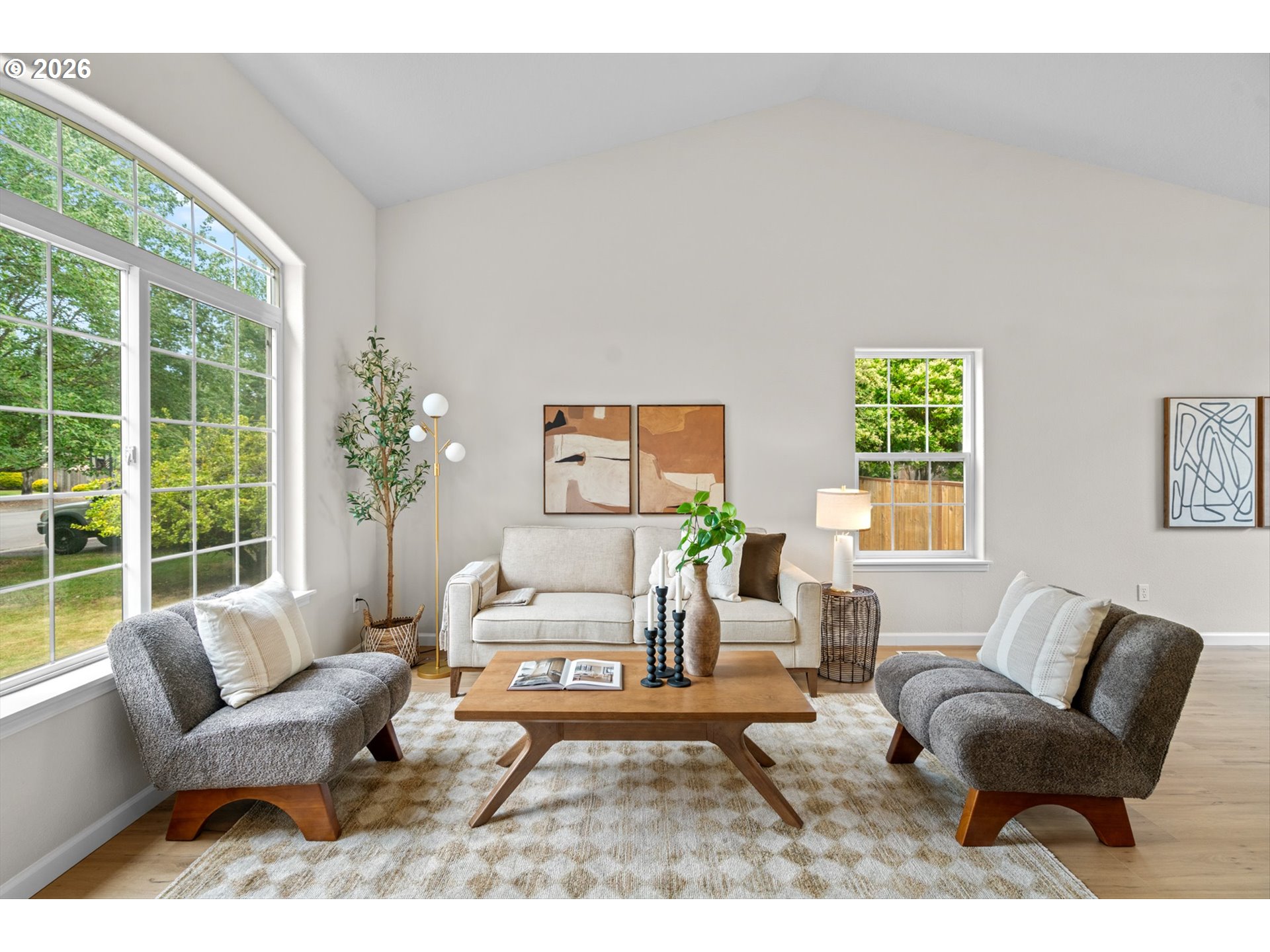462 Southwest 211th Avenue Beaverton, OR 97006 - Photo 6 of 40 a living room with furniture and a large window
