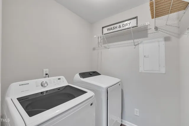a utility room with dryer and washer