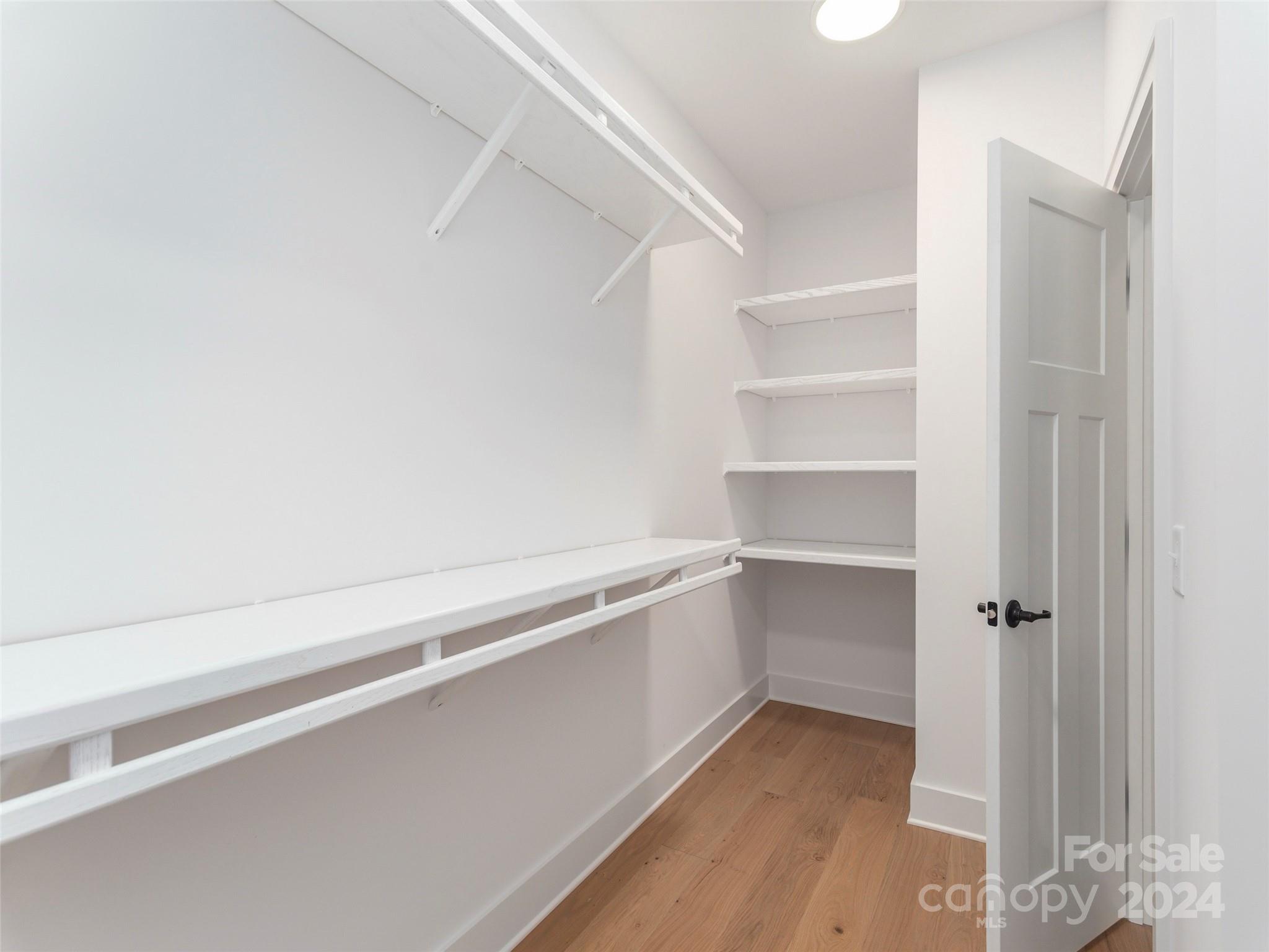 113 Millbrae Loop Hendersonville, NC 28791 - Photo 21 of 35 a view of an empty walk in closet