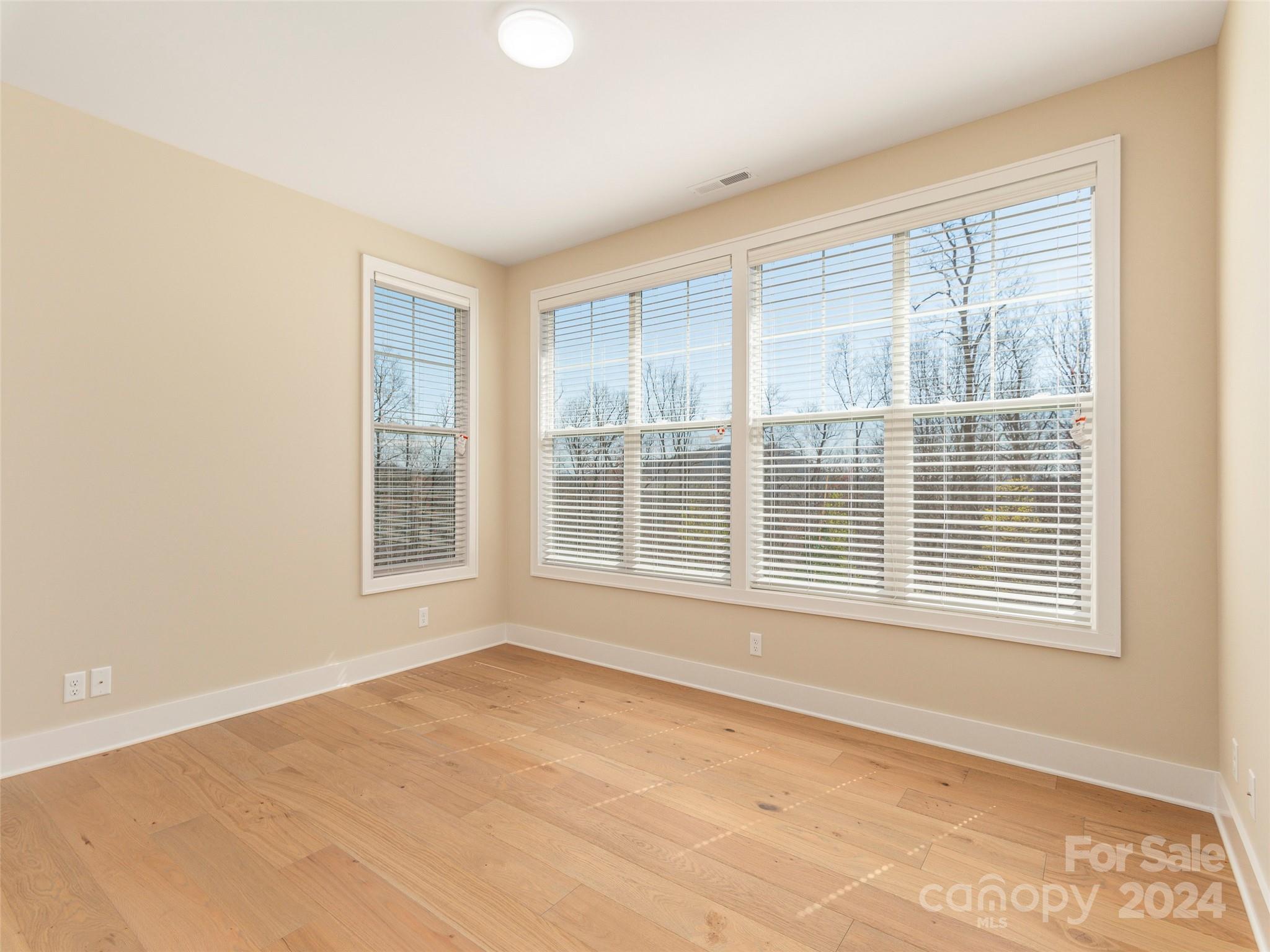 113 Millbrae Loop Hendersonville, NC 28791 - Photo 22 of 35 a view of an empty room with a window