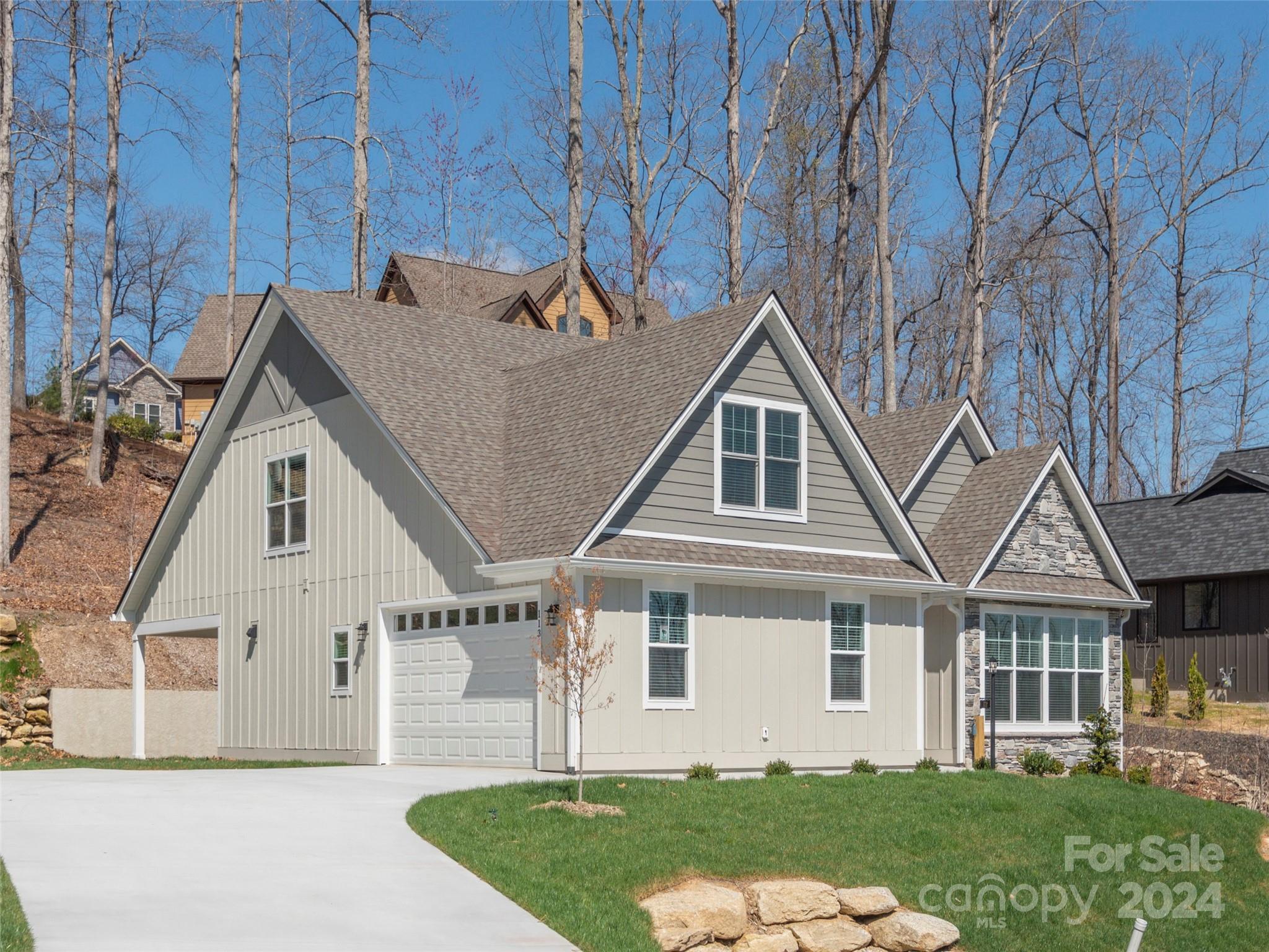 113 Millbrae Loop Hendersonville, NC 28791 - Photo 29 of 35 a front view of a house with a yard