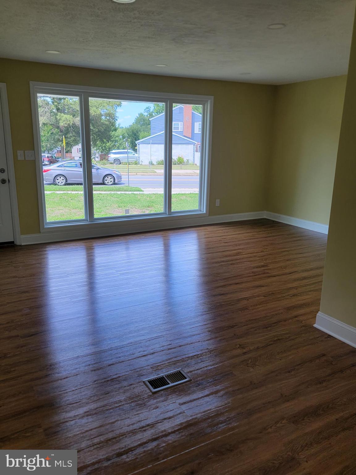 8300 Cathedral Avenue New Carrollton, MD 20784 - Photo 17 of 43 wooden floor with window