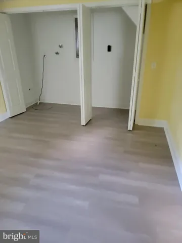 a bathroom with a toilet a sink and shower