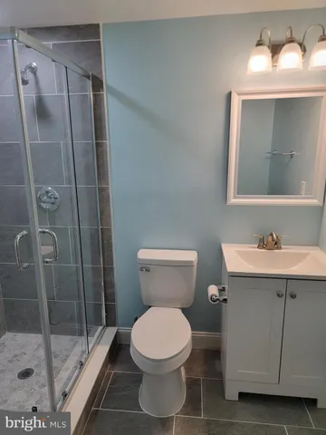 a view of a backyard with a small cabin