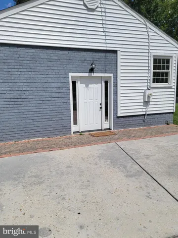 a front view of a house with a garage