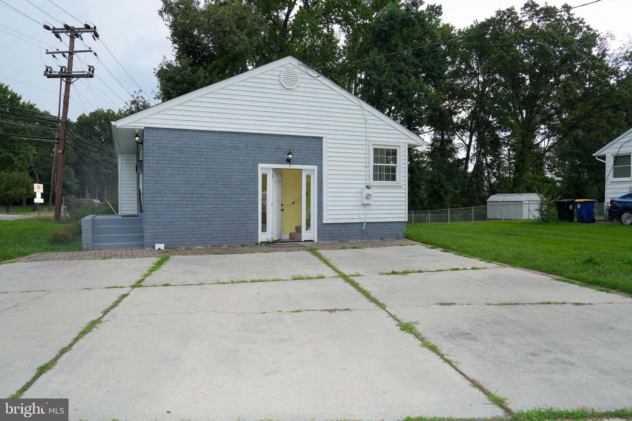 8300 Cathedral Avenue New Carrollton, MD 20784 - Photo 27 of 43 a front view of house with yard