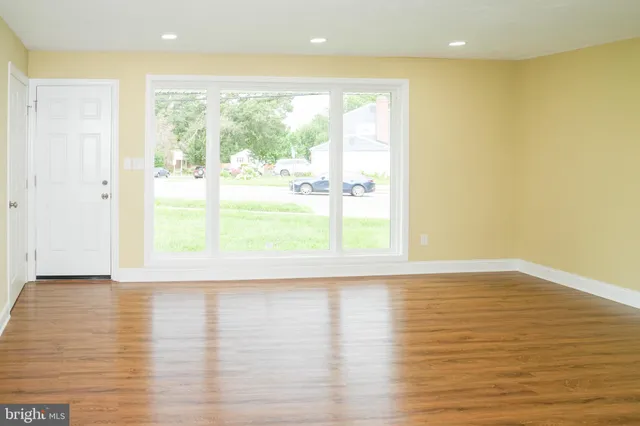 a bathroom with a window and shower