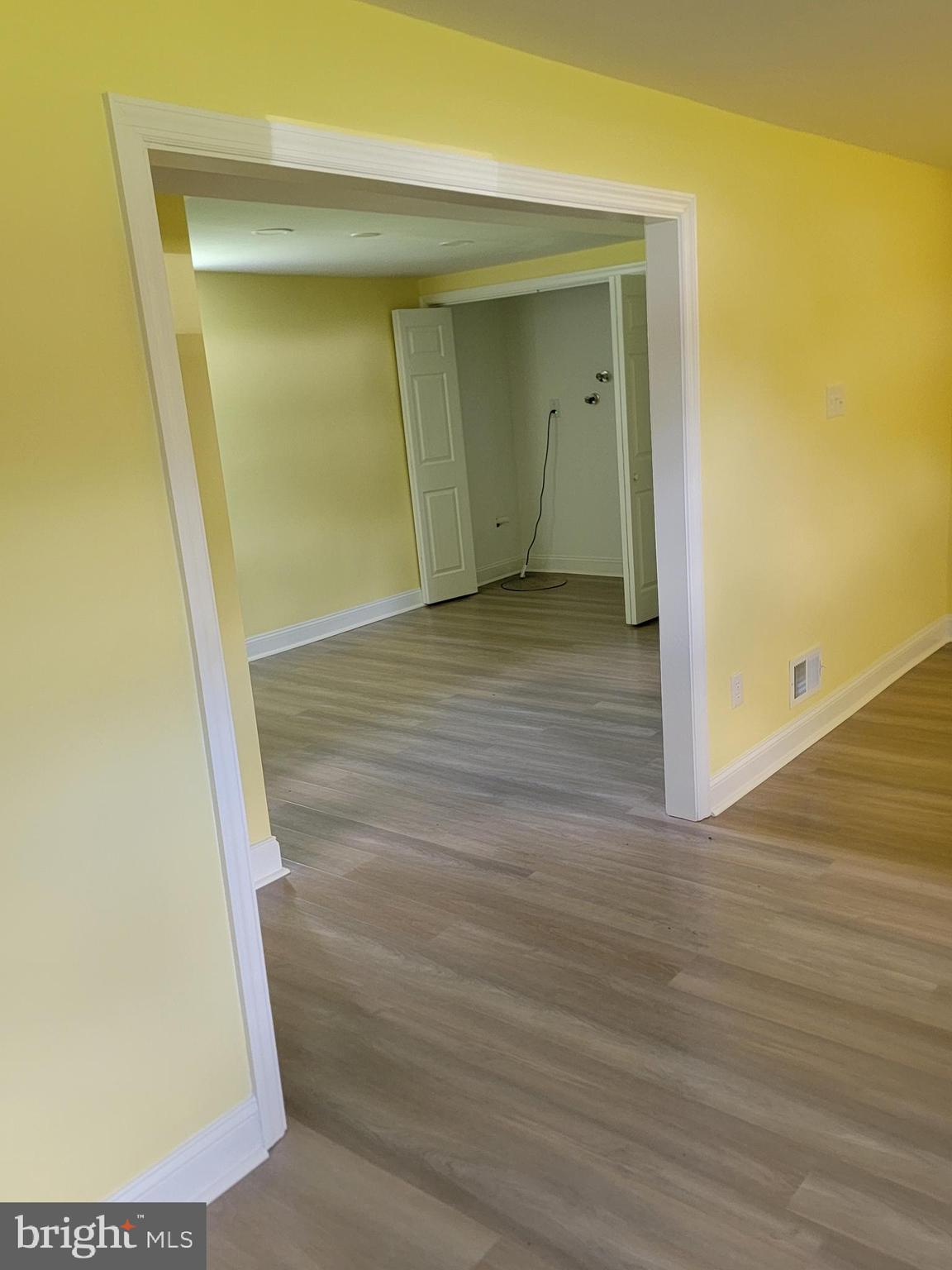 8300 Cathedral Avenue New Carrollton, MD 20784 - Photo 3 of 43 a view of wooden floor