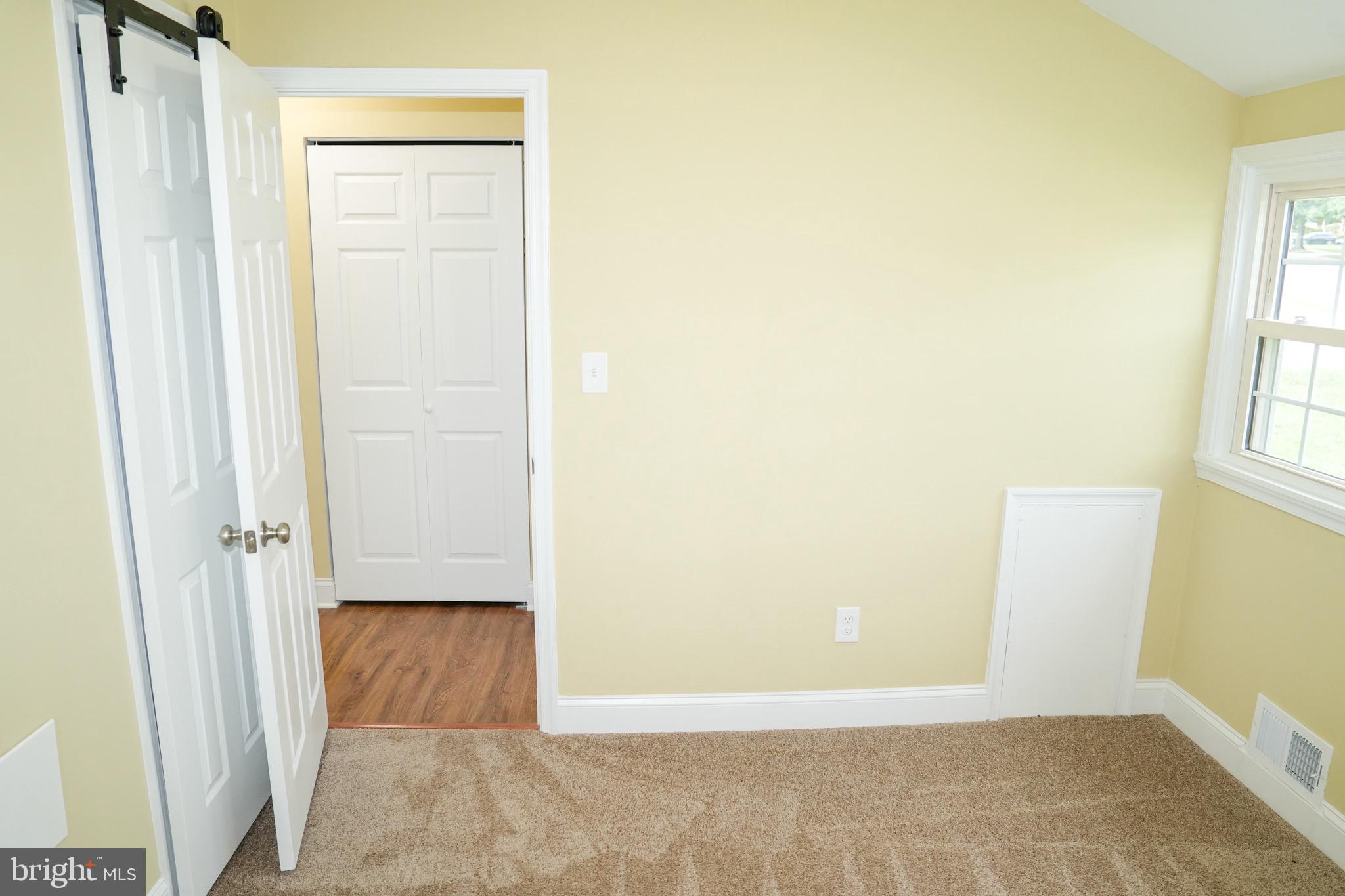 8300 Cathedral Avenue New Carrollton, MD 20784 - Photo 35 of 43 a view of an empty room