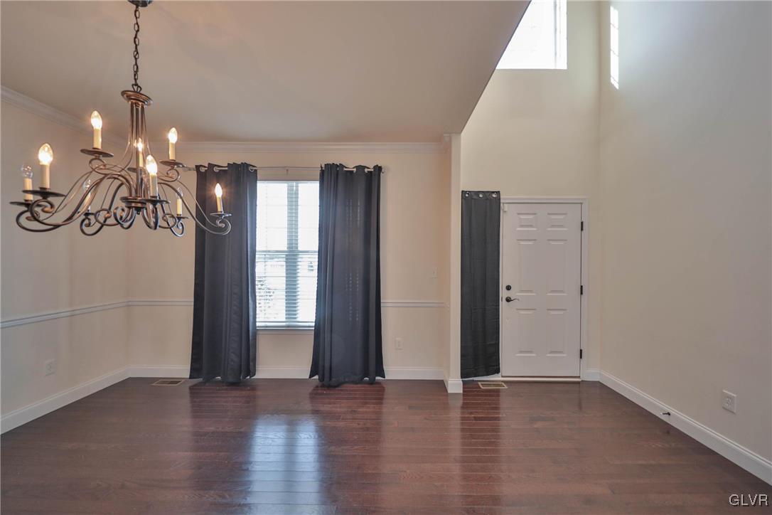 41 Joy Circle Barto, PA 19504 - Photo 12 of 57 a view of an empty room with window and wooden floor