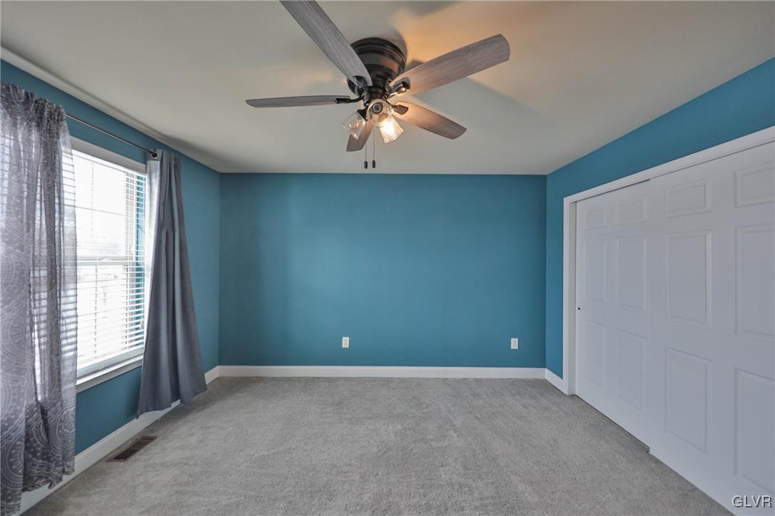 41 Joy Circle Barto, PA 19504 - Photo 39 of 57 a view of an empty room with window and cabinet