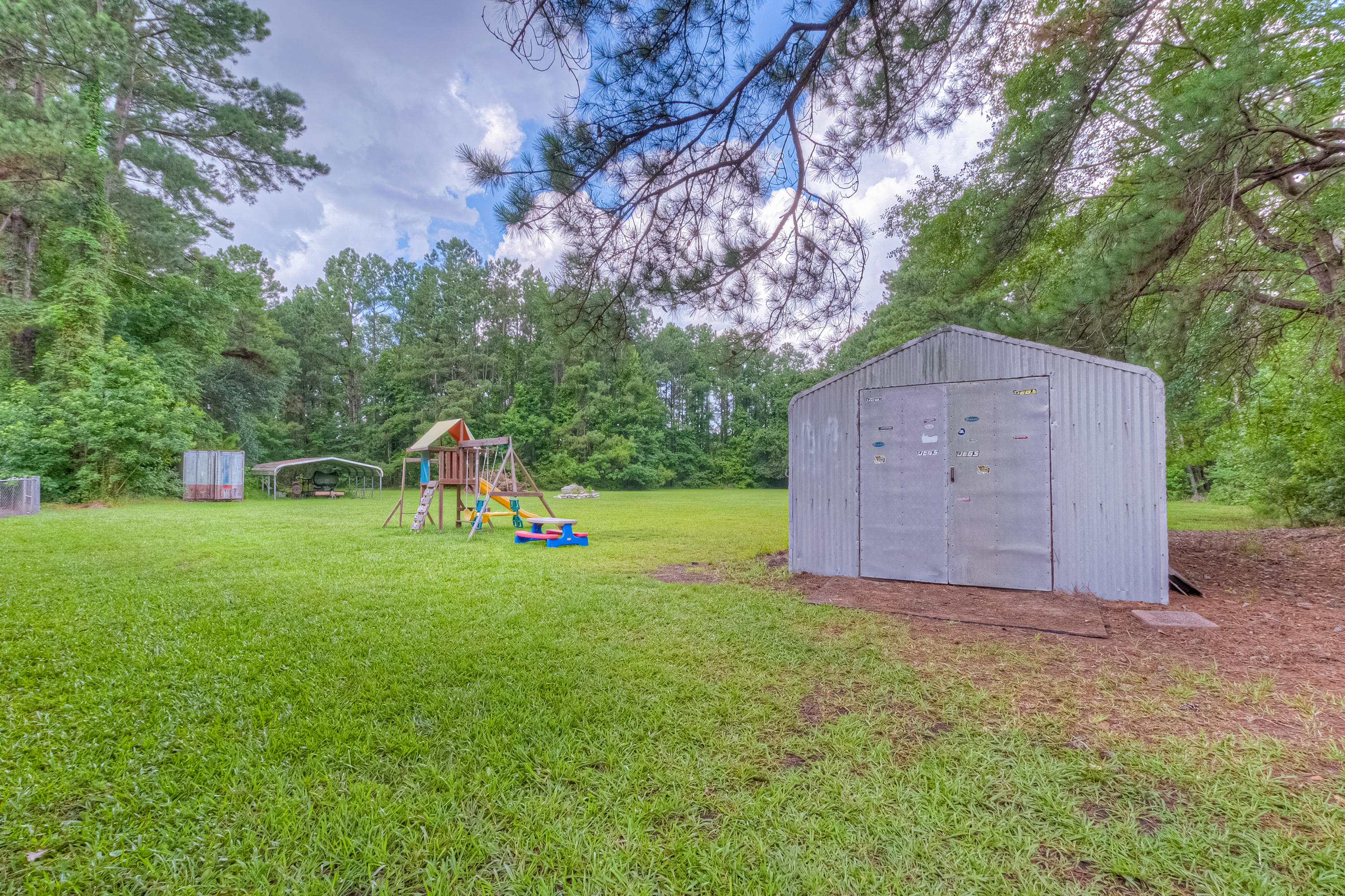 1837 Highway 61 Ridgeville, SC 29472 - Photo 53 of 54 Right side yard