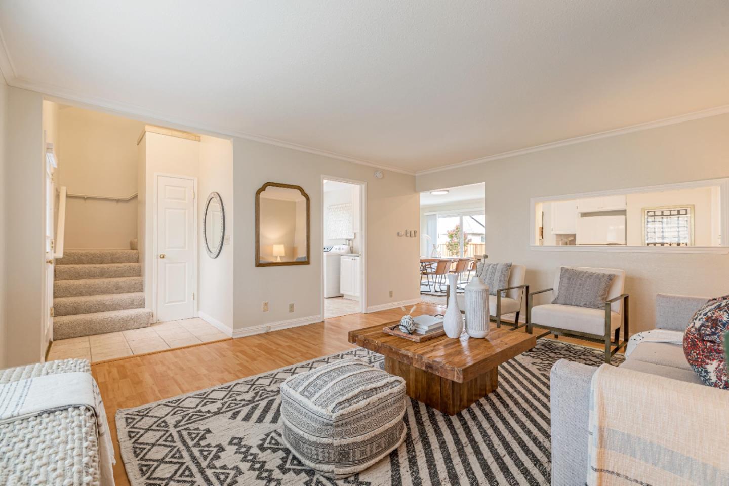 1298 Reeve Street Santa Clara, CA 95050 - Photo 12 of 28 a living room with furniture and a wooden floor