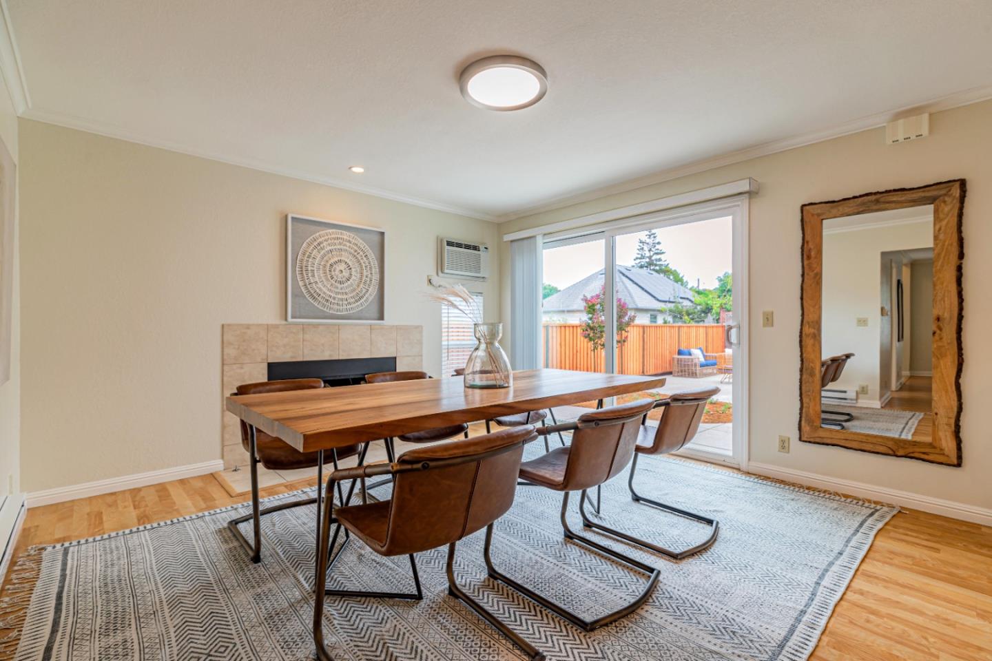 1298 Reeve Street Santa Clara, CA 95050 - Photo 13 of 28 a view of a workspace with furniture window and wooden floor