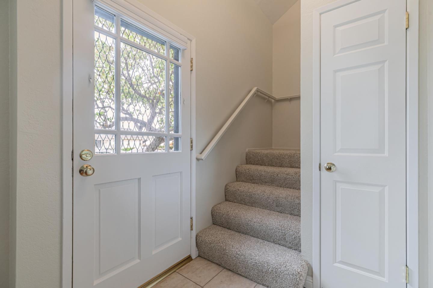 1298 Reeve Street Santa Clara, CA 95050 - Photo 19 of 28 a living room with furniture and a window