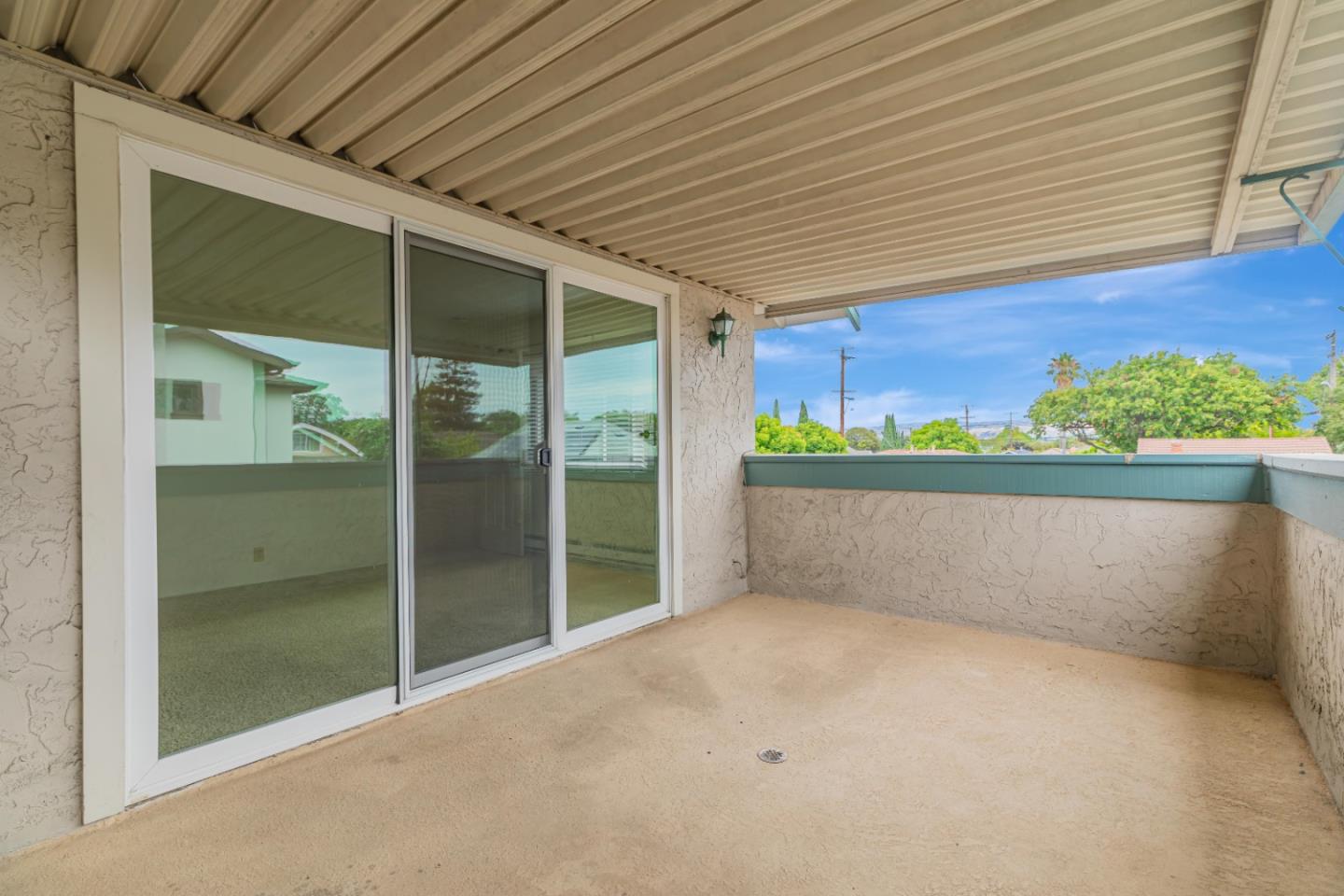 1298 Reeve Street Santa Clara, CA 95050 - Photo 22 of 28 a view of an empty room with a balcony