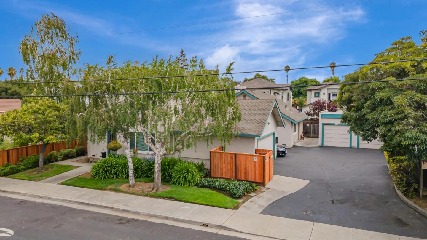 1298 Reeve Street Santa Clara, CA 95050 - Photo 25 of 28 front view of a house with a yard and potted plants