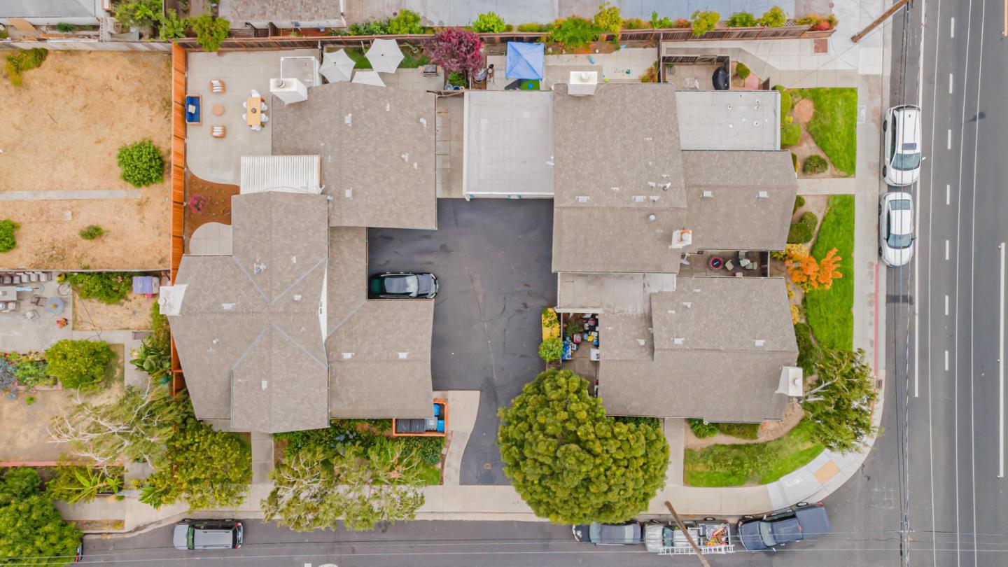 1298 Reeve Street Santa Clara, CA 95050 - Photo 28 of 28 an aerial view of a house with yard and swimming pool