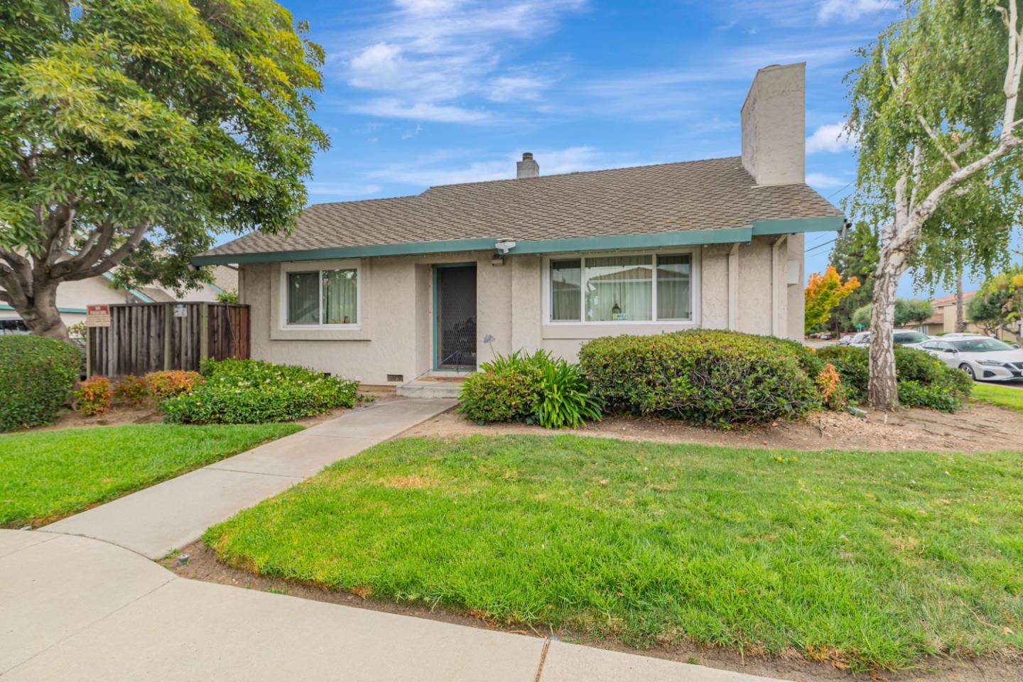 1298 Reeve Street Santa Clara, CA 95050 - Photo 4 of 28 a front view of a house with a yard