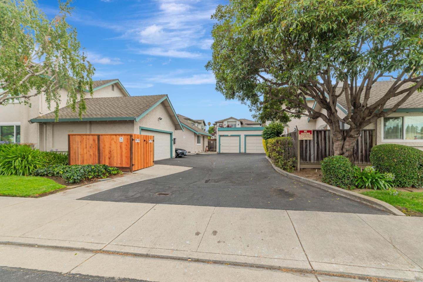 1298 Reeve Street Santa Clara, CA 95050 - Photo 5 of 28 a front view of a house with a yard and garage