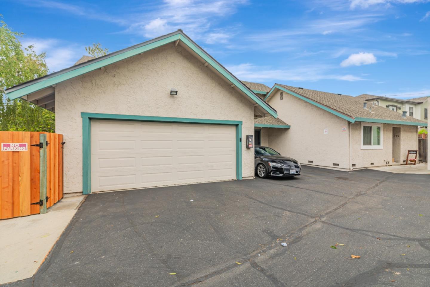 1298 Reeve Street Santa Clara, CA 95050 - Photo 8 of 28 a view of a house with garage and a car