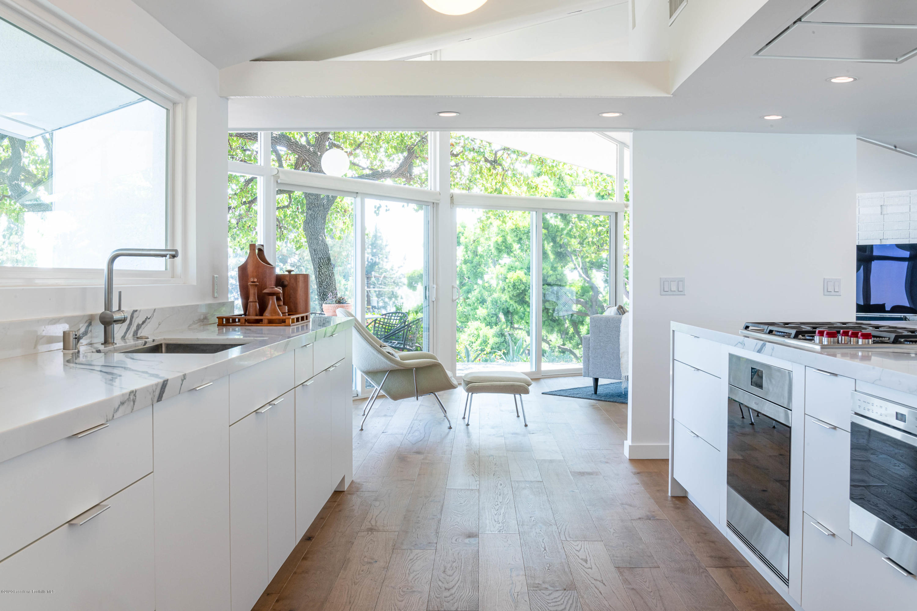 2210 Cielo Place Arcadia, CA 91006 - Photo 14 of 39 a kitchen with a stove a sink a counter top space and living room view