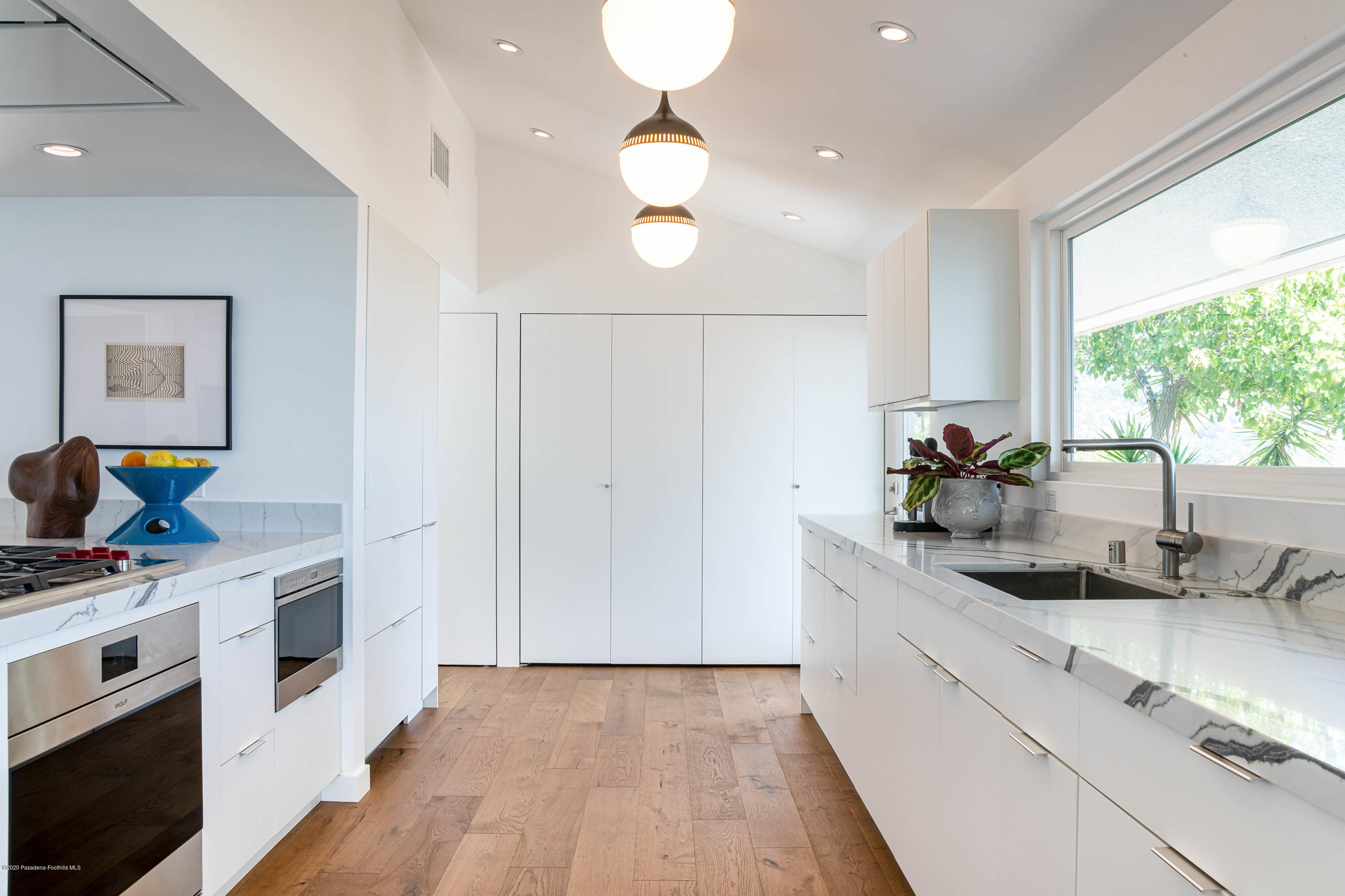 2210 Cielo Place Arcadia, CA 91006 - Photo 15 of 39 a kitchen with a sink and a stove top oven
